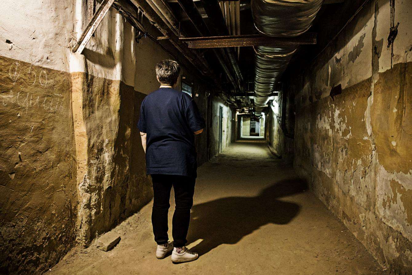 Anna Svesova stands underground beneath Trostianets Hospital in Sumy region, Ukraine.