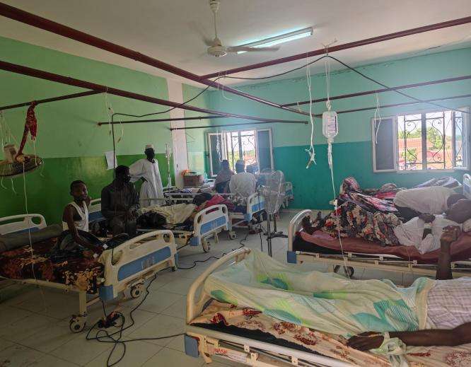 Hospital beds in a crowded room at South Hospital in El Fasher, North Darfur, Sudan.