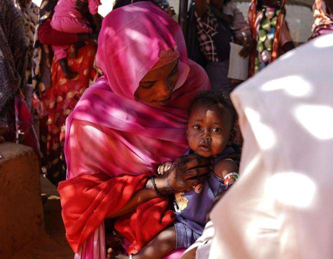 A mother and child at Zamzam camp in North Darfur, Sudan.