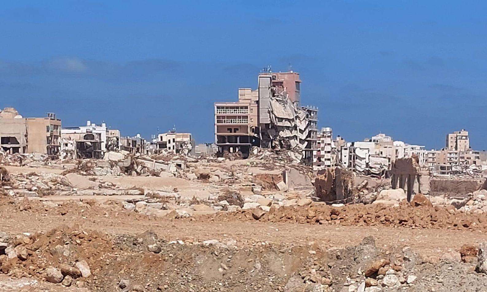 Crumbled cement buildings in a desert area of Derna where MSF is preparing further activities.