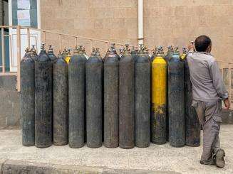 Oxygen cylinders lined up outside the intensive care unit of MSF's covid-19 treatment center at al-Kuwait hospital.