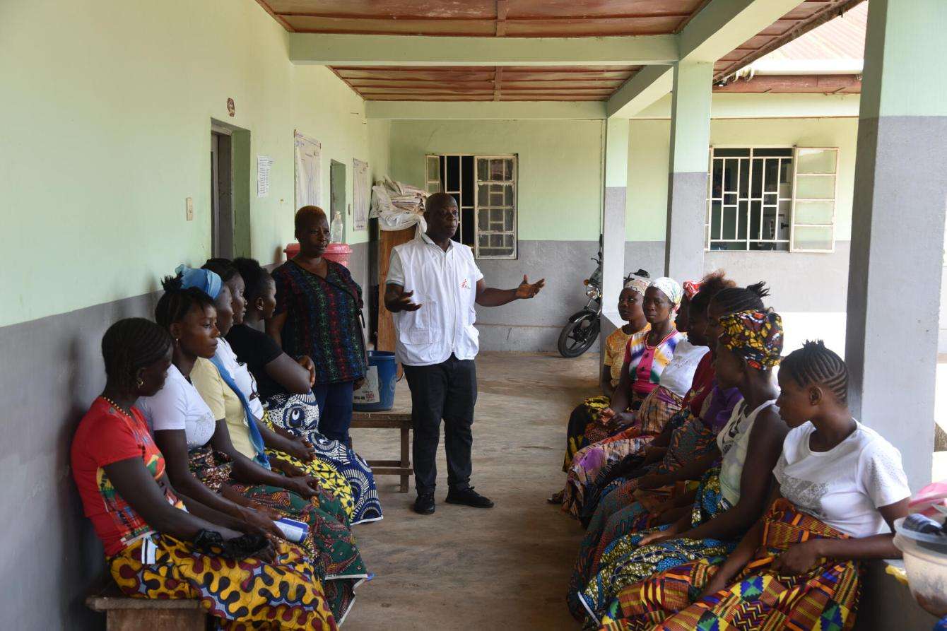 Health session at direct observation therapy site in Bombali, Sierra Leone.