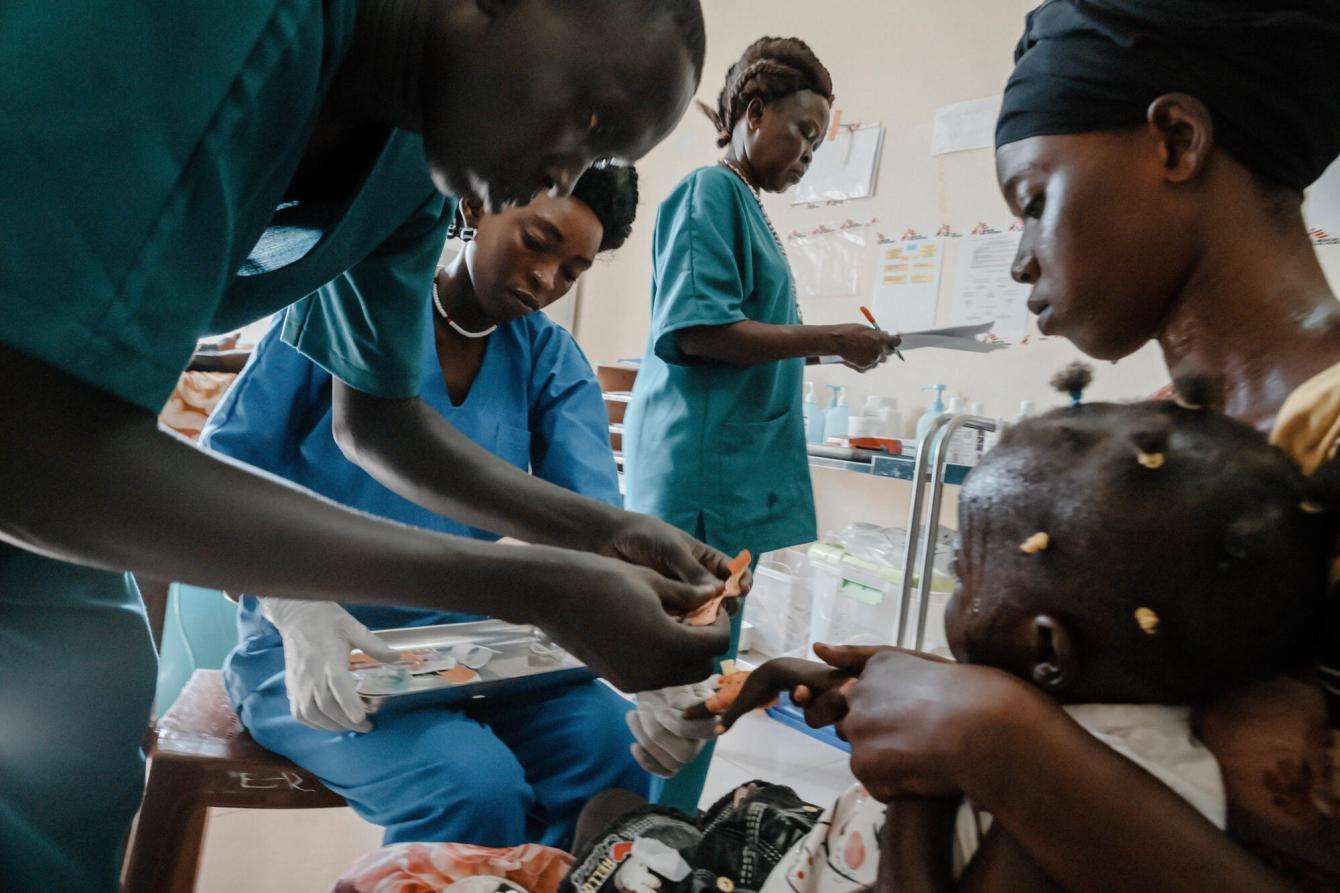Staff at Ameth Bek Hospital in Abyei, South Sudan, treat a child.