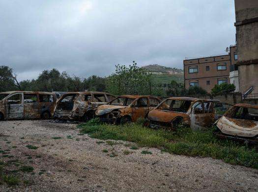 A row of burned cars that were set on fire by Israeli settlers in Huwara, West Bank, Occupied Palestinian Territories.