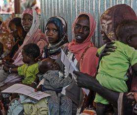 Displaced Sudanese women and children at MSF's clinic in Zamzam camp, Sudan.