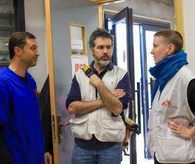 Christopher Lockyear speaks with other MSF staff on a visit to Gaza, Palestine.