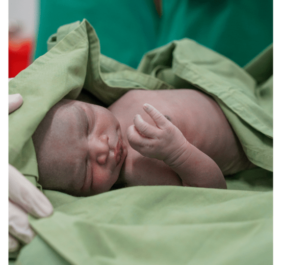 A newborn baby wrapped in a blanket at Mundari County Hospital, the only secondary healthcare facility in Kajo Keji, Central Equatoria in South Sudan.