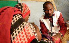 A woman and her child during a consultation at the MSF mobile clinic in Yakoua, Chad.