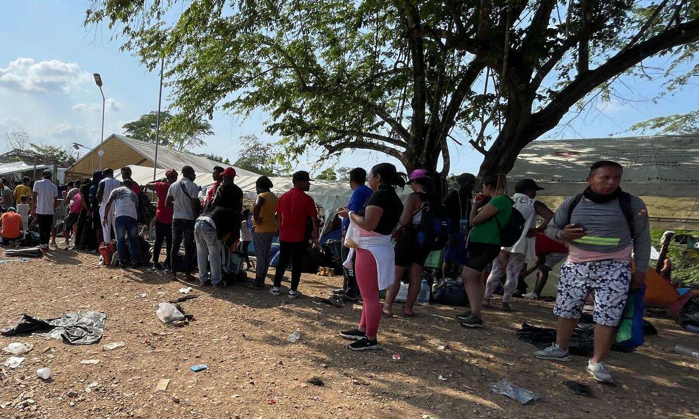 Hundreds of migrants arrive at reception centres after travelling through Darien jungle