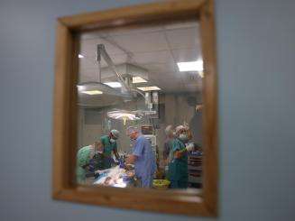 Operating theatre through a window in Nasser Hospital in southern Gaza.