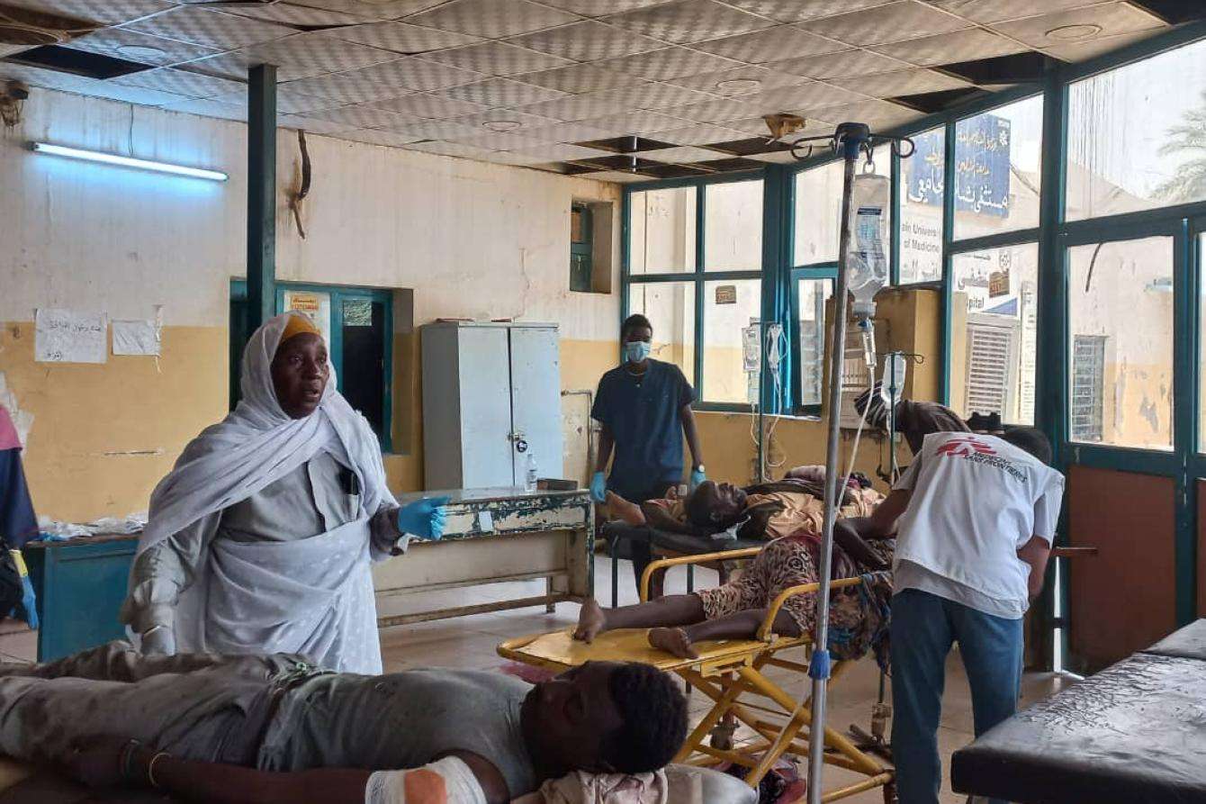 Wounded MSF patients on hospital beds and stretchers at Bashair Teaching Hospital in Khartoum, Sudan.