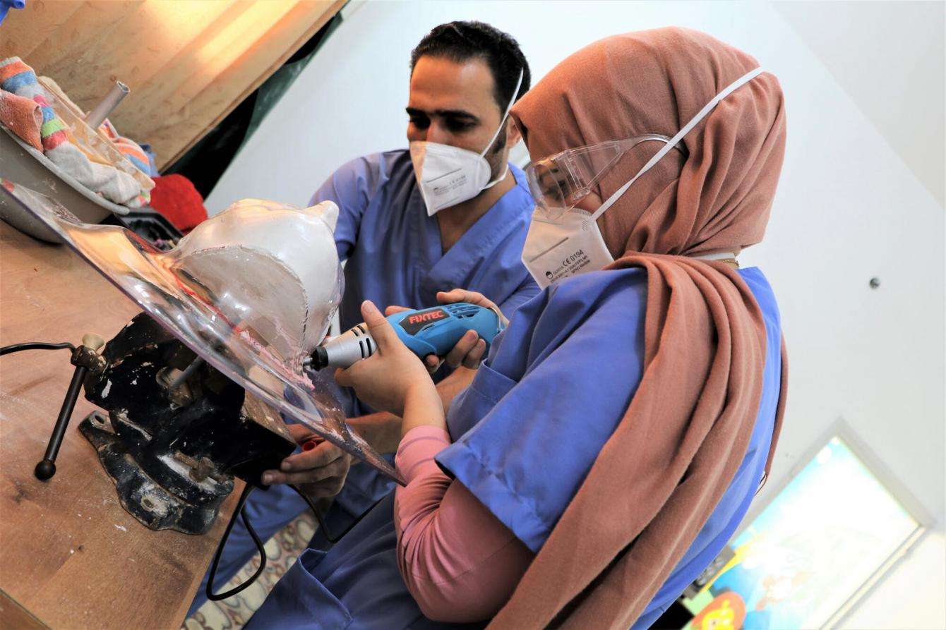 MSF medical teams create 3D printed face masks in a laboratory in Gaza.