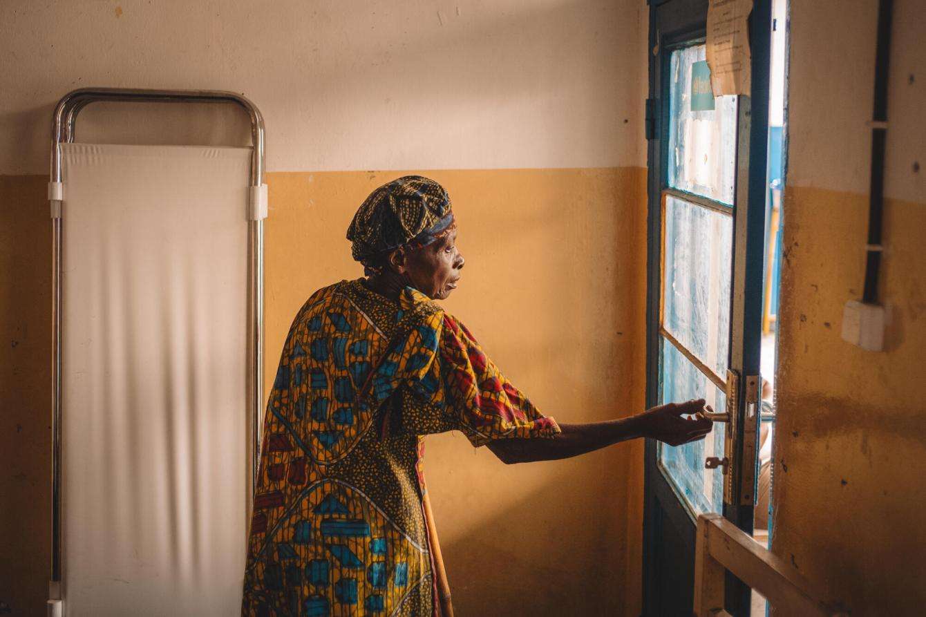 Jeanne Nyirarwango, 64, from Rugari in Rutshuru territory, leaves a consultation room in the MSF-supported Kanyaruchinya health center north of Goma, DR Congo.