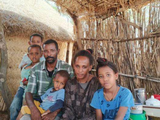 An Ethiopian refugee family in Um Rakuba displacement camp in Sudan.