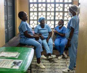 MSF midwives talk with one another at Chingussura health center in Beira, Mozambique.
