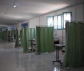 A line of empty hospital beds in a ward in northeast Syria.